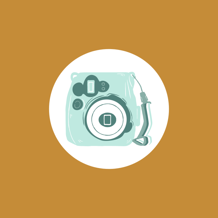 light blue polaroid camera with gold background